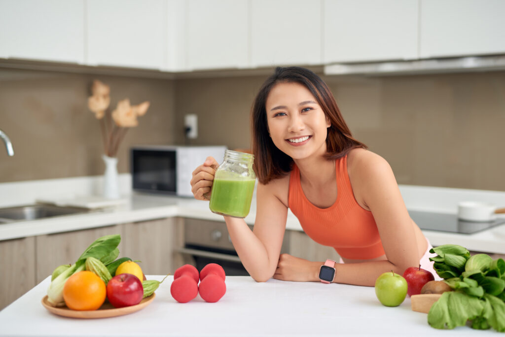 Woman holding a detox juice