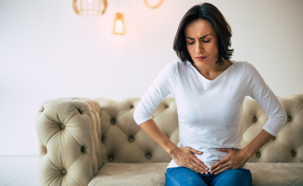 Woman experiencing UTI