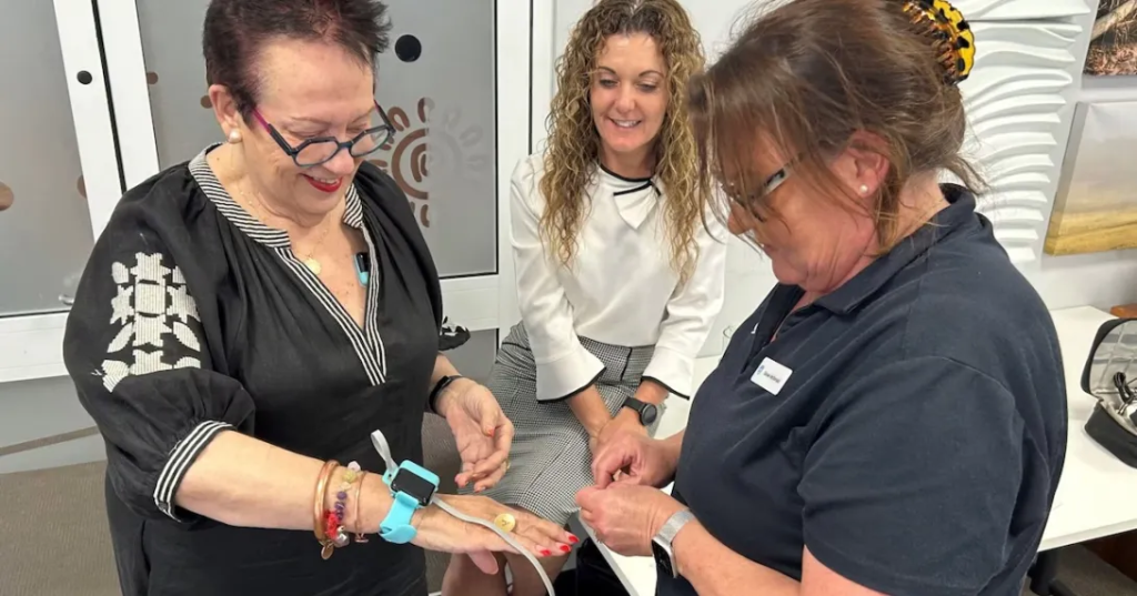Margaret Bennett and Summa Stephens demonstrating the Respiree device